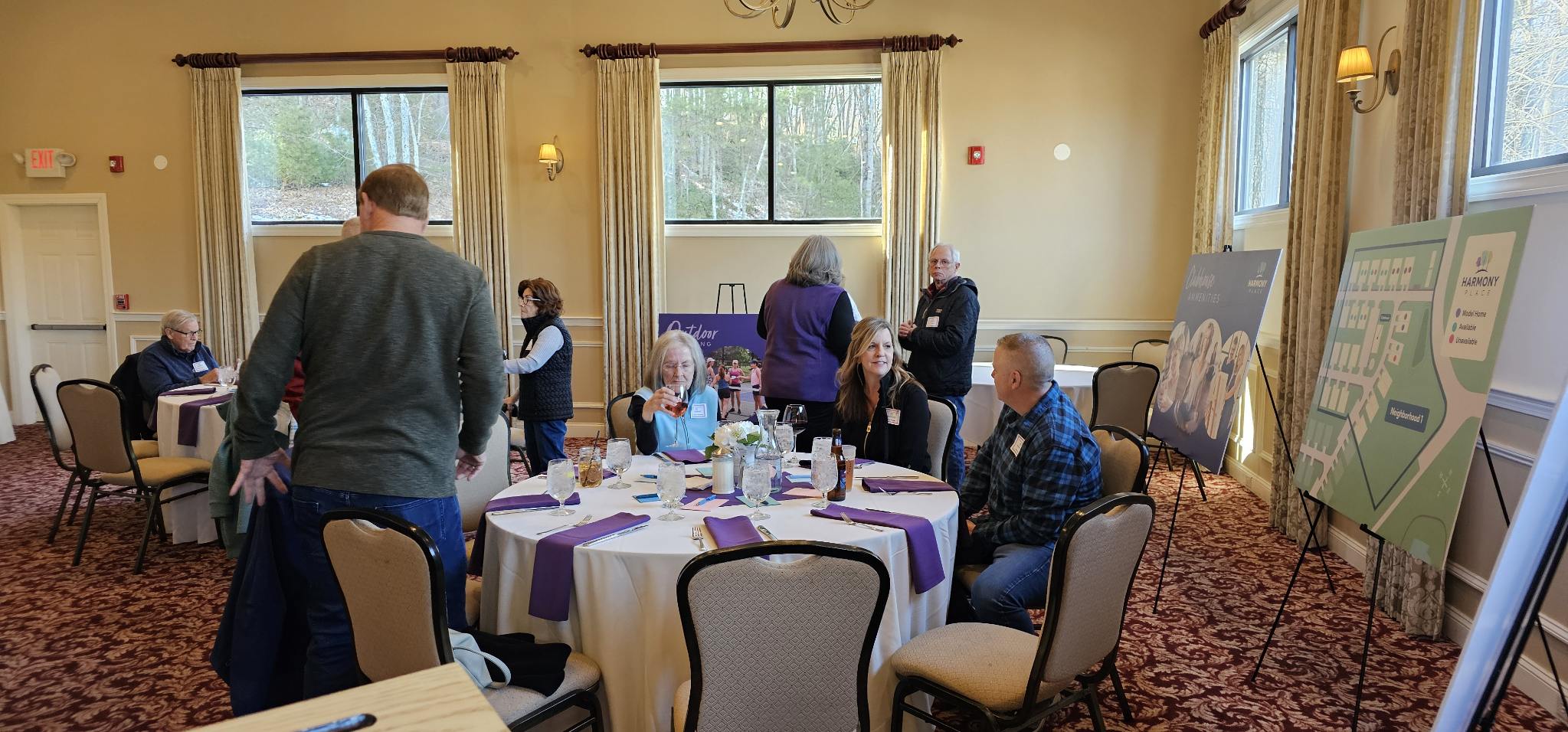 Group of homebuyers at a luncheon.