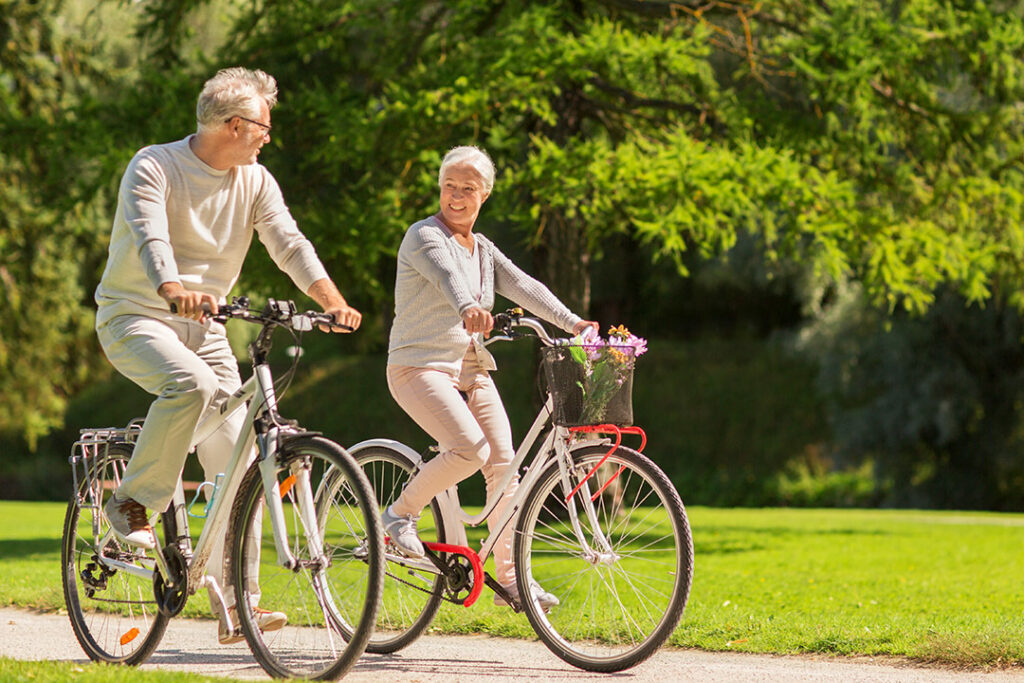 Retirement Community, 55+ Active Adult Community - Seniors Riding Bicycles in Rutland, MA