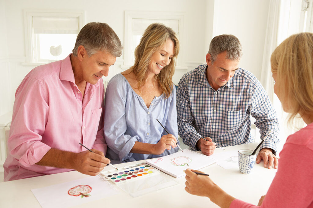 Two couples painting in art class, Harmony Place, Rutland, MA