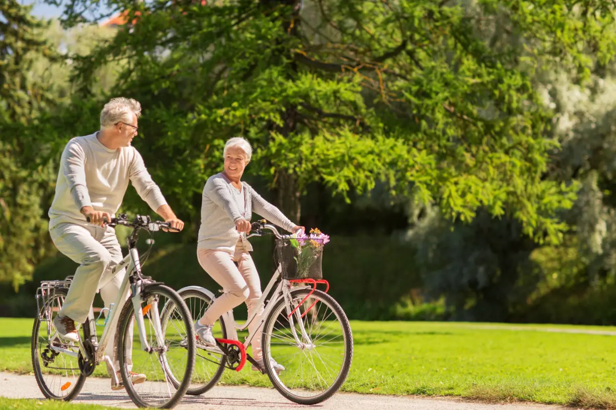 Active adults biking together in a walkable 55+ community